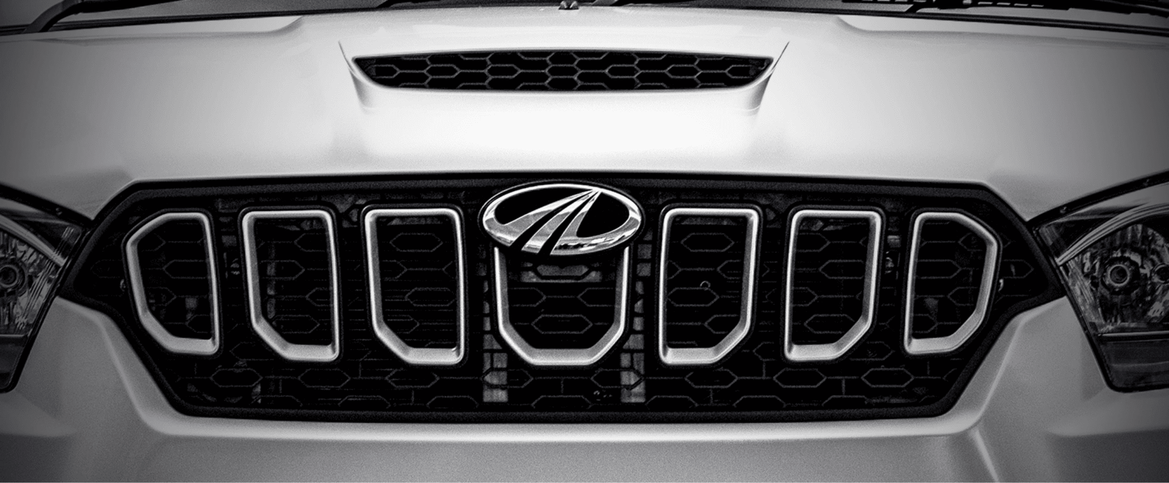 Integrated Bonnet Scoop and Signature Grille